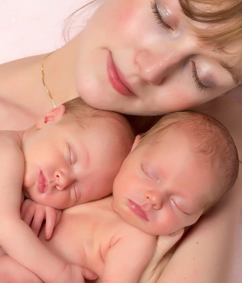 Mother Holding Twins